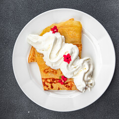 sweet crepes whipped cream pancake dessert delicious appetizer meal food snack on the table copy space food background rustic top view
