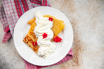 sweet crepes whipped cream pancake dessert delicious appetizer meal food snack on the table copy space food background rustic top view