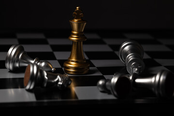 The chess king wins over his opponent. For creating business-related content