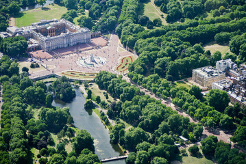 An Aerial View of London Landmarks and Skyline on a Sunny Day Featuring Buckingham Palace, The Mall...