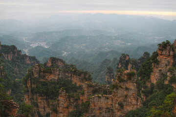 Fototapeta na wymiar Serenity in Nature_Vast Green Mountains under China's Blue Sky