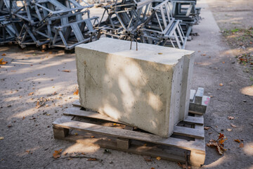 Cement pavement construction block on wooden pallet in a construction yard during project development