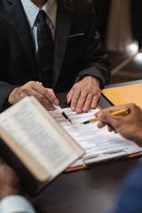 Lawyer reads law code, studies constitution to protect human rights before business contract signing, male lawyer or judge working with hammer of justice law book