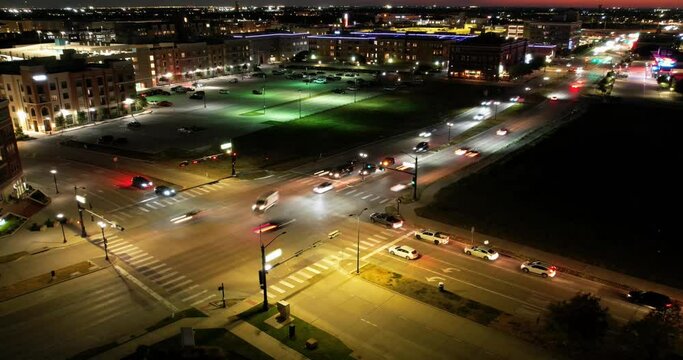Night traffic on Main street of Frisco, Texas