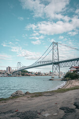 Florianópolis bridge with blue sky and sea in the background