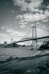 Florianópolis bridge with blue sky and sea in the background