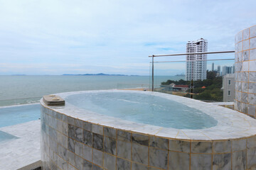 Modern rooftop swimming pool at the luxury hotel in Thailand