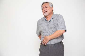 Asian senior man with back pain isolated on white background, Spinal degeneration or Dislocated...