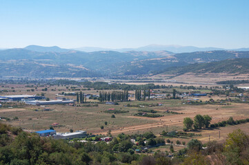 Fototapeta na wymiar Top view of rural landscape, fields in the Blagoevgrad valley, Southwestern Bulgaria