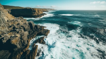 Fototapeta premium Turquoise Waters and Towering Cliffs: A Breathtaking Aerial View
