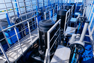 Industrial background pumping power station with electric generators and vacuum circulation pump