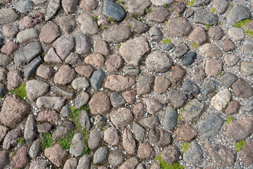 Cobblestone surface background top view. Cobblestone texture background