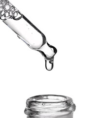 Pipette serum with clear liquid niacinamide, hyaluronic or Aha Bha acids on a white isolated...