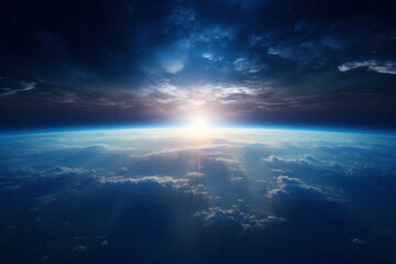 Obraz na płótnie Canvas The Sun Rising Over Earth From Space