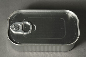
Photo of canned food on gray background and macro details
