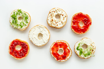 Fototapeta na wymiar Fresh baked bagels - food pattern. Healthy breakfast concept