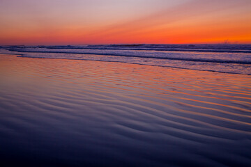 los colores del amanecer en la playa