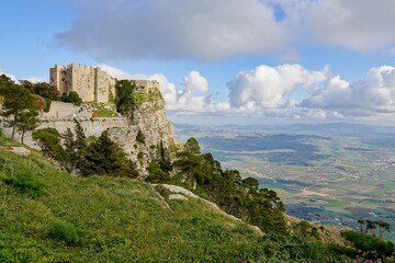 Landscape with Castello di Venere in Erice, Sicily, Italy and rocky mountain Monte Erice at sunset