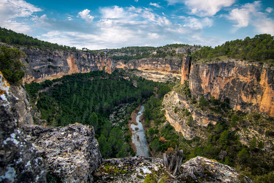 Landscape of the Hoces del R&iacute;o Cabriel in Cuenca, Spain with the river inside the walls of a large rocky canyon