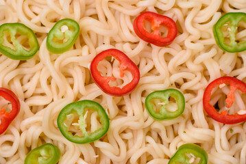 Delicious Asian cuisine dish with rice noodles, peppers, mushrooms and spices
