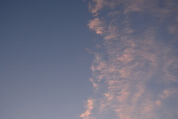 symmetrical blue sky and white clouds, perfectly smooth clouds against the blue sky 