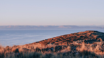 sunrise in the mountains with lake