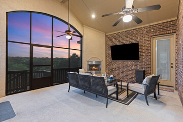 a screened patio at sunset