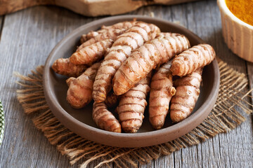 Fresh turmeric root on a table