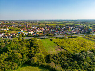 Fototapeta na wymiar Aerial view of Zagreb city Blato suburb on the southern outskirts of the city and vast agricultural fields