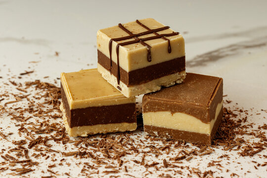 three bars of Moroccan chocolate or almond cream or peanuts with milk