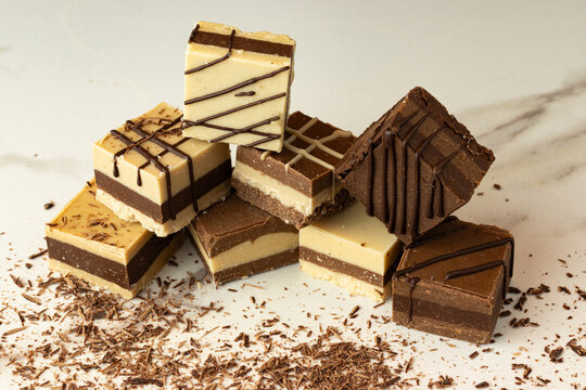 Cremino or Moroccan style chocolate bar with almonds and peanuts