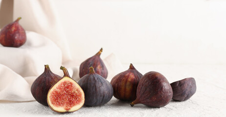  Fresh ripe figs on light table