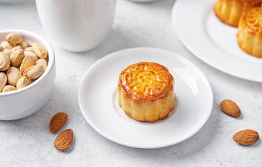 Moon cake with nuts in a plate