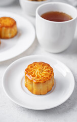 Moon cake with nuts in a plate
