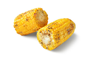 Cut tasty grilled corn cob on white background