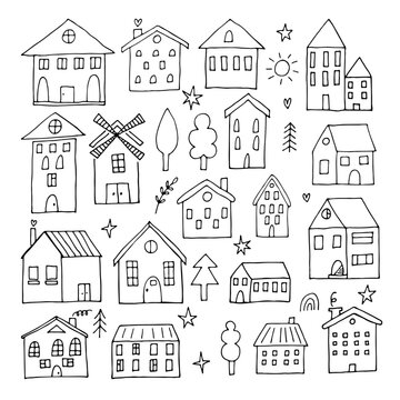 Collection of hand drawn houses. Doodle style. Set of sketched buildings