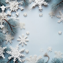 Fototapeta na wymiar Christmas and New Year background with snowflakes and Christmas tree branches. Winter holiday concept with space for text, copy space.