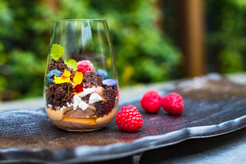 Chocolate mousse cake dessert with berries in glass