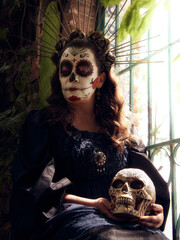 Mexican woman dressed up as a catrina