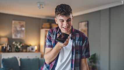 Obraz premium One man caucasian male teenager boy use mobile phone smartphone