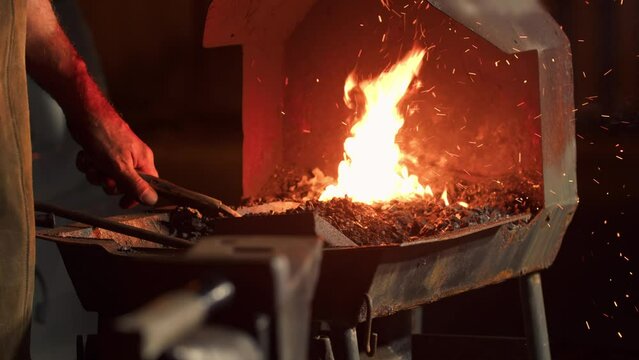 Fire in a Blacksmith's Furnace in a Blacksmith's Workshop Close-up, Slow Motion.