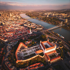aerial photos of bratislava castle with sunset colors - obrazy, fototapety, plakaty