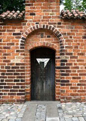 old brick wall and wooden door