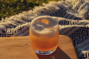 Cocktail on a wooden board