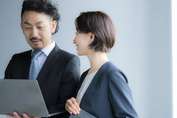 Obraz premium Supervisor looking at computer with subordinate Image of meeting or conference Upper body close-up Copy space available on the right