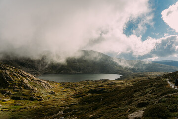 Fototapeta na wymiar fog in the mountains over a lake