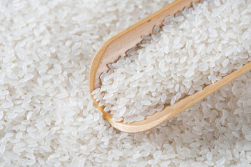 Fototapeta na wymiar white rice grain texture background, close up shot of the rice background