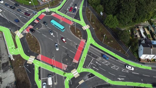 Aerial view vehicles turning on St Helens CYCLOPS traffic optimisation junction crossroad intersection
