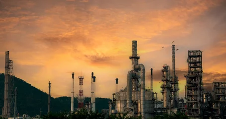 Fotobehang Oil refinery gas petrol plant industry with crude tank, gasoline supply and chemical factory. Petroleum barrel fuel heavy industry oil refinery manufacturing factory plant. Refinery industry concept © aFotostock