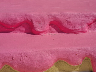 Empty pink color texture pattern cement wall background. Used for presentation products